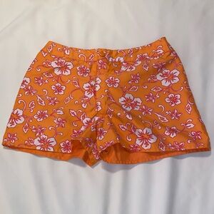Orange shorts with flowers. Size: Medium (10-12) Girls